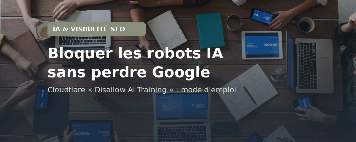 Équipe autour d'une table de travail avec ordinateurs et tablettes - Bloquer les robots IA sans perdre Google